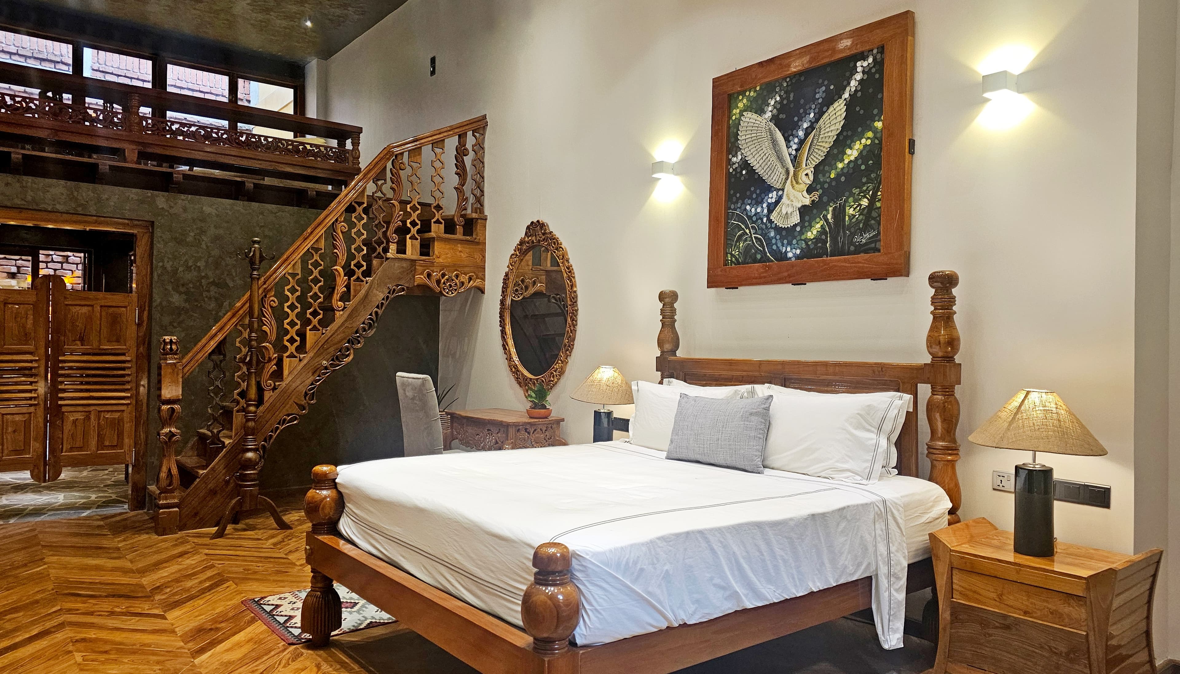 Luxurious bedroom with traditional wooden staircase